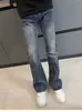Jeans azules de corte acampanado elásticos estilo americano Cleanfit, lavados vintage, desgastados, con orejas de gato, pantalones adelgazantes para hombre para primavera y otoño