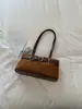 Bolsa de ombro retrô de alto valor para mulheres, nova bolsa de mão casual estilosa para o dia a dia, bolsa de ombro única de nicho francês