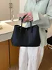 Bolsa de Mão de Luxo Modelo Saco Feminina Nova Primavera 2026 Versátil Bolsa Tote de Lona Popular Bolsa Transversal