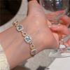 Pulsera cuadrada europea y americana de oro con cordón y micro incrustaciones de circonitas 2023 nicho temperamento versátil joyería de mano J121