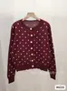 Cárdigan de punto jacquard de lunares en color de contraste para mujer, nuevo estilo otoño 2025, estilo dulce casual, simple y versátil, top ligero