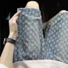 Shorts de Mezclilla Jacquard Azules para Hombre Verano 2025 Nuevo Diseño Rasgados de Cuatro-Cinco Minutos de Largo Pantalones Casuales Sueltos de Longitud Media