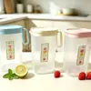 Jarra con 4 tazas modelo nuevo para uso doméstico de plástico, jarra de agua fría, set de gran capacidad con cuatro tazas