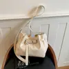 Bolsa tote de gran capacidad Shuai Mi Jia para mujer, nuevo modelo de verano 2026, elegante y atractiva, adecuada para ir al trabajo, bolso de hombro y cruzado
