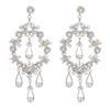 Brincos leves de luxo elegantes com gotas d'água vazadas, brincos de diamante estilo asiático Simi para mulheres, vestido de noiva, brincos de borla exagerados