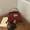 Estilo Nuevo Otoño 2026 es un Bolso de Mano Moderno y Sencillo con Diseño de Cierre de Candado para Mujer, Elegante, de Alto Valor, Bolso Cruzado Elegante