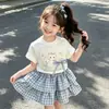 Verano 2026 Nuevo para Niñas Camiseta Linda con Estampado de Gatito Infantil Divertido Dibujo Animado Versátil Top Conjunto de Falda y Pastel