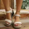 Sandalias de cuña tejidas de paja de una sola tira transfronterizas, sandalias romanas de verano para exteriores de talla grande, venta al por mayor para tiendas independientes de Amazon