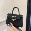 2025 Nuevo Bolso Kelly de Moda Estilo Ins Chica Viajera Versión Coreana Bolso de Hombro Bolso de Mano Versátil a la Moda Bolso Cruzado