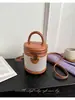 Bolso tipo cubo de alta gama transfronterizo para mujer, nuevo bolso de hombro de moda 2026 con bloques de color, bolso cruzado versátil para el día a día