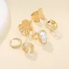 Europa y Estados Unidos diseño transfronterizo sensación lava líquida flor anillo abierto ins barroco imitación perla conjunto anillo de piedras preciosas