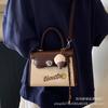Bolsa Cruzada al por Mayor del Fabricante 2026 Nueva de Moda Elegante Bolso Cuadrado Pequeño Bolso de Mano Versátil de Moda Bolso Pequeño con Bloques de Color