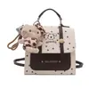 Bolso de Mujer Estilo Universitario 2026 Mochila Simple para Mujer Bolso Cruzado para Viajes Diarios Mochila Multifuncional