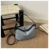 Bolso pequeño súper popular para mujer, nuevo bolso de mano de nicho 2026, elegante y versátil, se puede llevar al hombro o cruzado