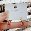 Pendientes de celebridad de Internet con hebilla de oreja de esmalte rojo de amor festivo de Año Nuevo, ligeros y de lujo que combinan con todo, de nicho, de alta gama y coloridos.