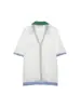 Comercio Exterior Transfronterizo Verano 2026 Nuevo Estilo Europeo y Americano Manga Corta Cuello Camisero Calado Tejido Top + Conjunto de Shorts Casual Versátil