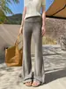 Nueva colección de otoño e invierno: Pantalones para mujer con forro de polar, corte holgado y ligeramente acampanados, con un diseño negro fluido, versátiles para uso casual, deportes y yoga, con efecto adelgazante