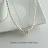 Collar minimalista y elegante de perlas Swarovski con diamantes completos, diseño de nicho de lujo ligero, versátil y sofisticado, modelo de alta venta nuevo 2026
