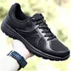 Nuevos zapatos de entrenamiento de fitness para hombre, zapatos tácticos negros transfronterizos, zapatos de correr transpirables y ligeros, zapatos de bombero, zapatos de liberación, zapatos de goma, 2026