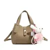 Bolsas Femininas de Nicho Transfronteiriças 2026 Nova Super Popular Bolsa Cesta de Platina de Nicho com um Toque de Luxo, Bolsa de Ombro Cruzado