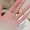 Colar de pérolas circular rotativo, corrente de clavícula de luxo leve nicho de alta qualidade, fresco e delicado, colar versátil e elegante
