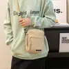 Bolsa Pequena de Lona Estilo Japonês Estilo Coreano Feminina Nova Primavera 2024 Leve Casual Prática Ombro Transversal Bolsa para Celular