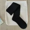 Nueva colección de principios de otoño de 2026: calcetines de algodón para mujer de color liso avena, transpirables, estilo coreano y de longitud media hasta la pantorrilla