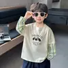 Camiseta de manga larga para niño, nuevo modelo otoño 2026, top de otoño para niño, ropa de bebé de dibujos animados de imitación de dos piezas para niño