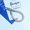 Huayang Macaron Cordón de Teléfono Colorido Correa de Muñeca Anti-Pérdida de Gama Alta Llavero Colgante para Bolsa Venta al por Mayor