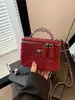 Bolso acolchado de pedido extranjero para mujer, bolso cruzado moderno y versátil, nuevo bolso de hombro Otoño/Invierno 2026, bolso de caja con cadena
