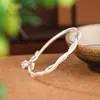 Pulsera de Tobillo de Plata Trenzada Retorcida Rodeando Flor de Lirio del Valle 9999 Viento Creativo para Mujer Colgante de Flor Carrillón de Viento Pulsera Abierta Mate Modelo para Mujer