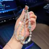 Llavero de coche único con diseño de estrella de doble capa con cuentas, cadena para teléfono moderna y elegante, colgante de pentagrama para bolso