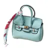 Mini bolso platino, charm para bolso de mujer, accesorio de llavero de coche lindo y creativo, bolsa para auriculares, bolsa para lápiz labial, bolso tipo cubo