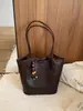Bolso tote grande de patrón tejido transfronterizo para mujer, nuevo modelo 2026, bolso de hombro de color liso simple y elegante estilo coreano de nicho