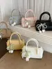 Bolso tipo almohada exquisito súper popular transfronterizo para mujer, nuevo estilo verano 2026, lujo ligero, nicho, alta gama, versátil, de hombro, cruzado