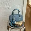 Bolso de mano de mezclilla con bloques de color para mujer, nuevo bolso tipo almohada, elegante y simple, adecuado para ir al trabajo, bolso cruzado