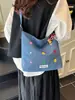 Bolso de Mezclilla de Alta Gama de Nicho Transfronterizo para Mujer 2026 Nuevo Bolso de Hombro Cruzado de Moda Bolso Cubo para Viajes