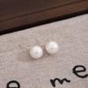 Aretes de Aguja de Plata Retro Francés Perla de Imitación Pequeños Panecillos al Vapor Otoño e Invierno Lujo Ligero Sensación de Alta Gama Blanco Moda Aretes Elegantes