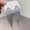 Aretes largos de borla de circonita 2023 nuevo diseño nicho sentido temperamento alto sentido personalidad aretes mujer mayoreo