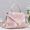Bolso de mano único e irregular de retazos de colores vibrantes retro y moderno, bolso de mujer con solapa de jacquard de alto valor, bolso de moda
