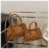 2025 Versión Coreana Nuevo Bolso de Cubo de Mano Casual Simple para Viajar Textura Color Sólido Bolso de Mano de Axila Bolso Cruzado para Mujeres