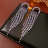 Pendientes de Plata Estilo Europeo y Americano con Círculos Incrustados de Diamantes y Borlas, Sensación de Lujo Ligero y Gama Alta, Pendientes Exagerados de Nicho con un Diseño Único