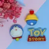Cor sólida Doraemon gatinho jingle acessórios de cola de creme atacado acessórios de resina atacado adesivo para capa de celular