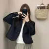 Chaqueta casual con cuello en V de diseño para mujer 2026 otoño nuevo versátil adelgazante temperamento gabardina corta moderna