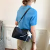 Bolsa pequena leve e simples para mulheres, nova moda 2026, bolsa transversal casual de nicho, bolsa de ombro versátil para o dia a dia e para o trabalho