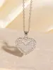 Collar Europeo y Americano Nuevo Estilo Hueco de Amor para Mujer Colgante en Forma de Corazón Chapado en Cobre y Oro Diseño de Nicho Joyería Transfronteriza de Gama Alta