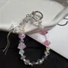 Nueva cadena para teléfono de borla de mariposa con cuentas en forma de estrella, ligera, lujosa y delicada, perfecta para bolsos de niñas y como llavero