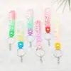 6030 # Color Degradado Caucho Suave Cordón de Cuero Llavero Accesorios Inglés Burbuja Versátil Moda Correa de Muñeca Lanyard Accesorios