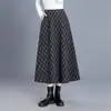 Falda retro de cuadros línea A para mujer, nueva colección otoño 2026, de cintura alta, que cubre la cadera, casual, adelgazante y acampanada.
