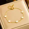 Moda europea y americana temperamento retro simple chapado en oro flor de concha blanca accesorios cadena joyería de acero inoxidable